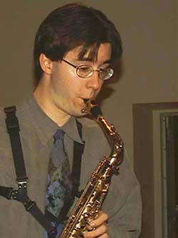 Ryan Fraser plays his sax.